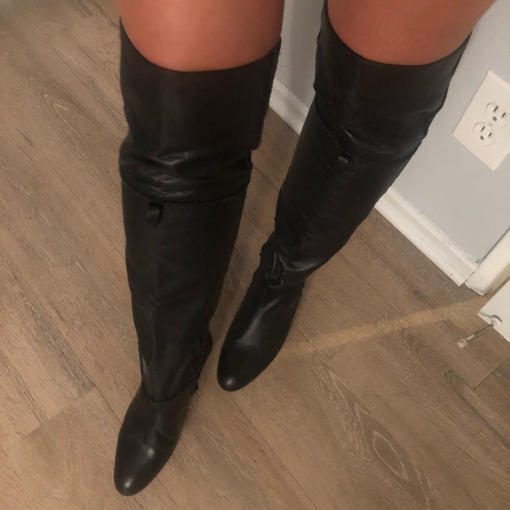 Black leather thigh high boots